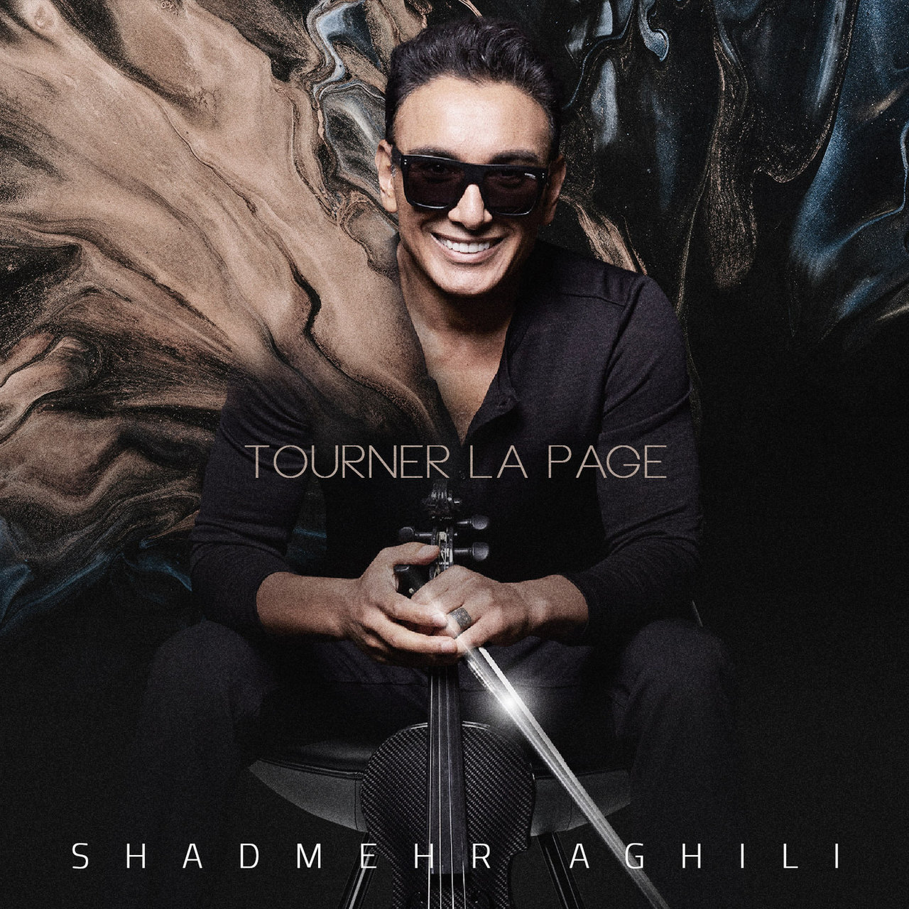 دانلود آهنگ جدید شادمهر عقیلی به نام Tourner La Page